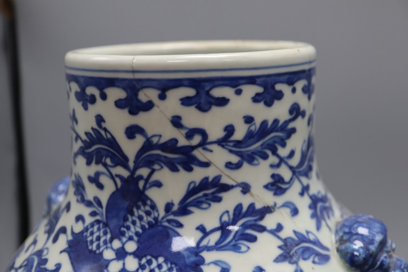 A Chinese blue and white vase, height 39cm (damaged)